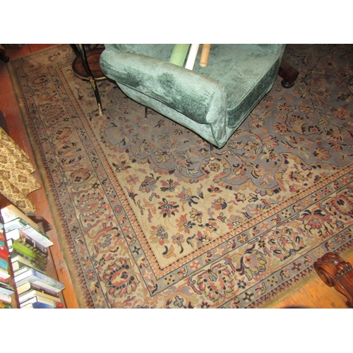 85 - Pure Wool Rug Cream Ground with Patterned Borders Approximately 10ft 6 Inches Long x 7ft 6 Inches Wi... 