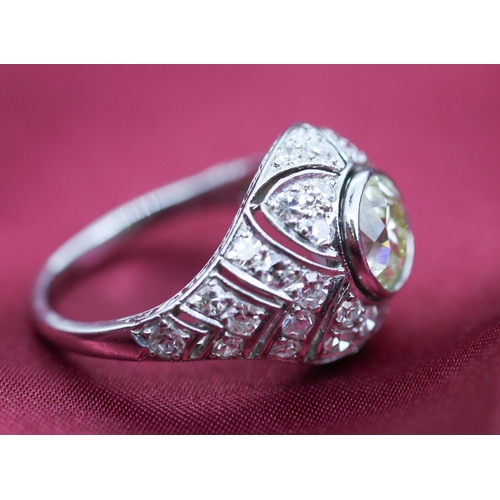 101 - Finely Detailed Diamond Bezel Set Centre Stone Ring with Further Diamond Cluster Set Surround Mounte... 