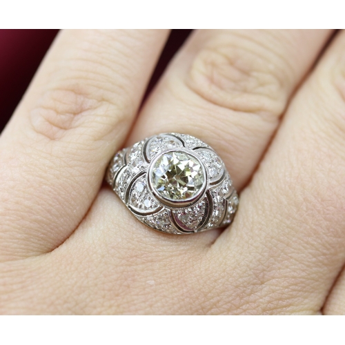 101 - Finely Detailed Diamond Bezel Set Centre Stone Ring with Further Diamond Cluster Set Surround Mounte... 