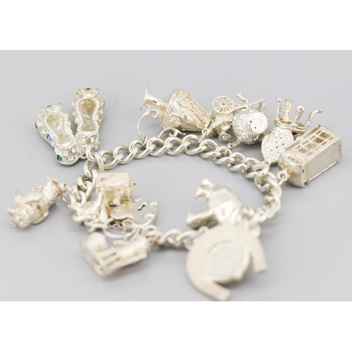 111 - Silver Charm Bracelet with Eleven Charms Heart Padlock Clasp and Safety Chain 18.5cm Long