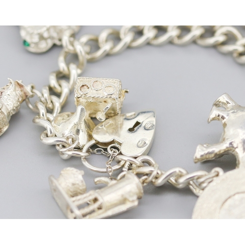 111 - Silver Charm Bracelet with Eleven Charms Heart Padlock Clasp and Safety Chain 18.5cm Long