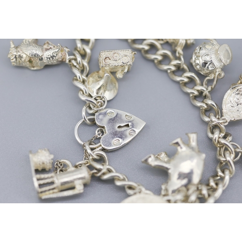 111 - Silver Charm Bracelet with Eleven Charms Heart Padlock Clasp and Safety Chain 18.5cm Long