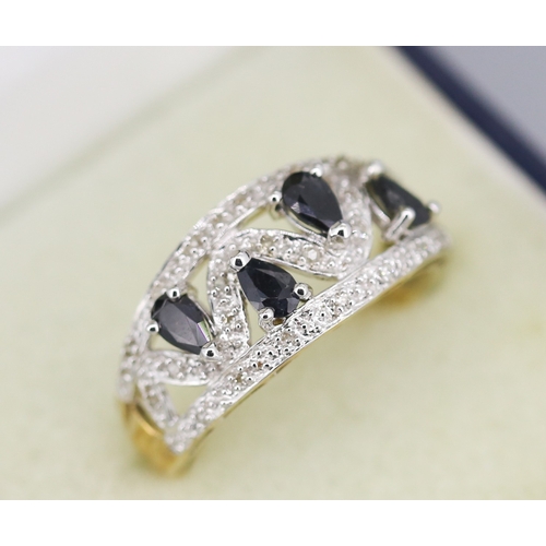 112 - Sapphire Pear Cut Four Stone Set Ring with Further Diamond Set Surround Mounted in 9 Carat Yellow Go... 