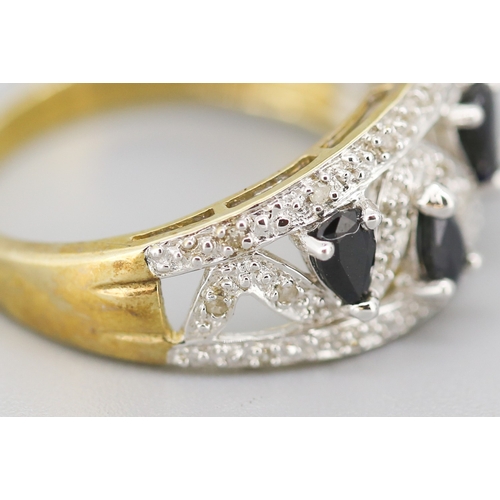 112 - Sapphire Pear Cut Four Stone Set Ring with Further Diamond Set Surround Mounted in 9 Carat Yellow Go... 