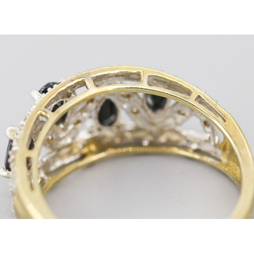 112 - Sapphire Pear Cut Four Stone Set Ring with Further Diamond Set Surround Mounted in 9 Carat Yellow Go... 