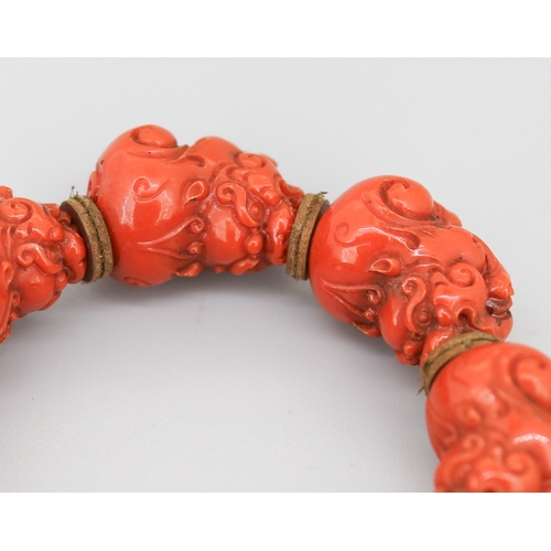 119 - Attractively Detailed Carved Red Coral Pixiu Feng Shui Bracelet