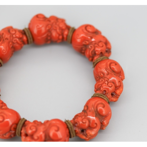 119 - Attractively Detailed Carved Red Coral Pixiu Feng Shui Bracelet