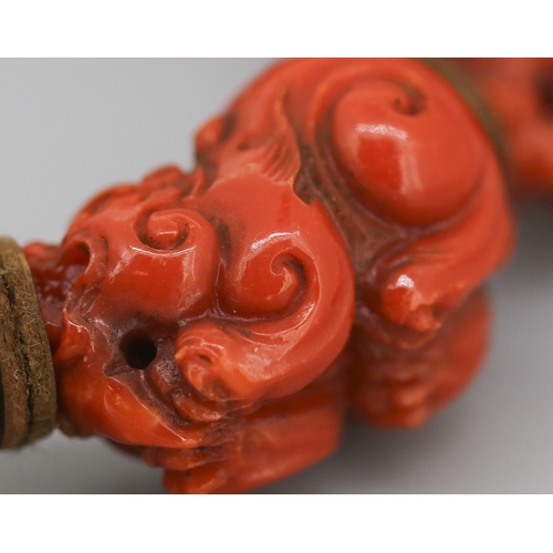 119 - Attractively Detailed Carved Red Coral Pixiu Feng Shui Bracelet