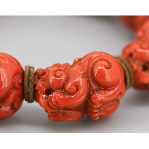 119 - Attractively Detailed Carved Red Coral Pixiu Feng Shui Bracelet