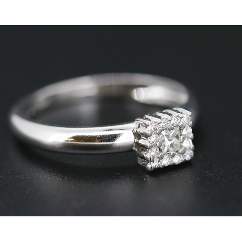 243 - Princess Cut Diamond Centre Stone Ring with Round Cut Diamond Set Surround Mounted in 18 Carat White... 