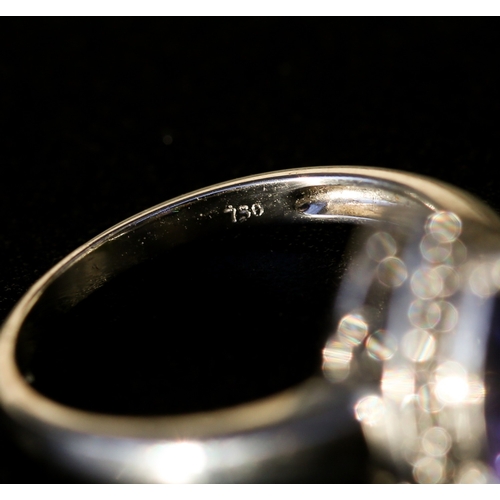 25 - Pear Cut Tanzanite Set Ring with Diamond Inset Surround Mounted in 18 Carat White Gold Ring Size O a... 
