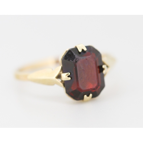 259 - Red Garnet Set Single Stone Ring Mounted in 9 Carat Yellow Gold Ring Size P