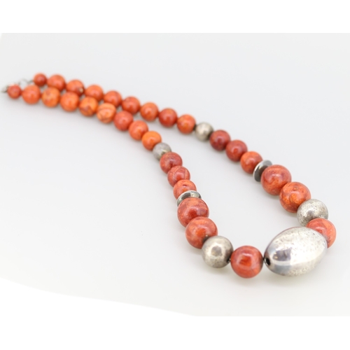 260 - Coral and Silver Bead Graduated Form Necklace Incised Floral Motifs 45cm Long