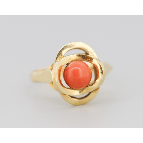 271 - Coral Bead Set Knot Form Ring Mounted in 18 Carat Yellow Gold Ring Size P