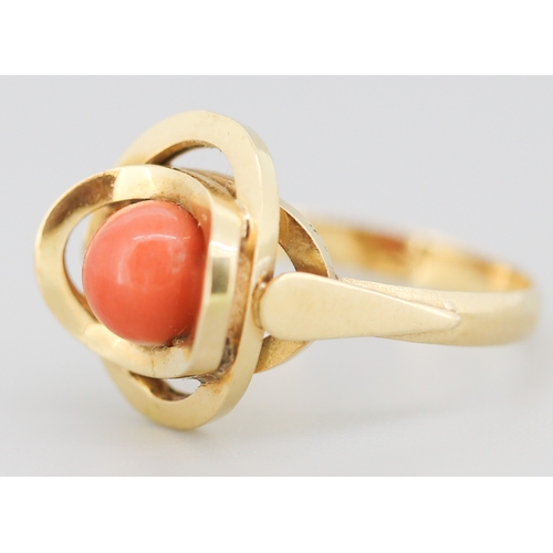 271 - Coral Bead Set Knot Form Ring Mounted in 18 Carat Yellow Gold Ring Size P