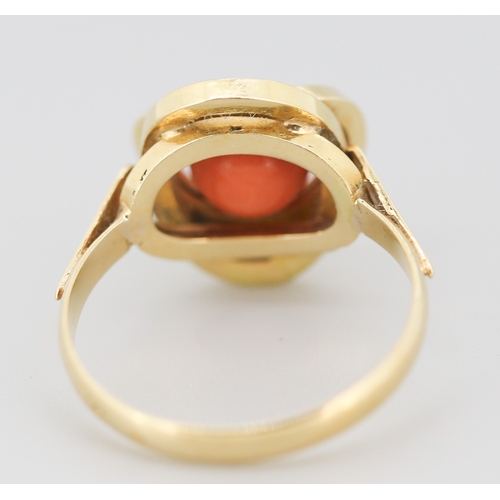 271 - Coral Bead Set Knot Form Ring Mounted in 18 Carat Yellow Gold Ring Size P