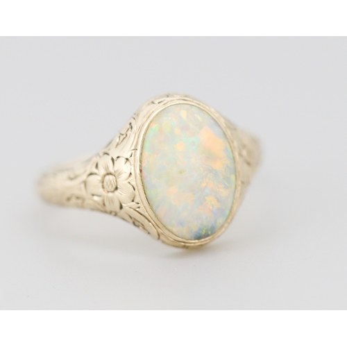 273 - Synthetic Opal Single Stone Set Ring Incised Floral Motifs Mounted in 9 Carat Yellow Gold Ring Size ... 