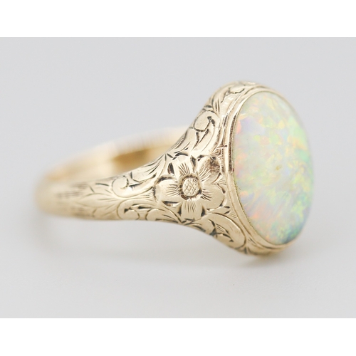 273 - Synthetic Opal Single Stone Set Ring Incised Floral Motifs Mounted in 9 Carat Yellow Gold Ring Size ... 