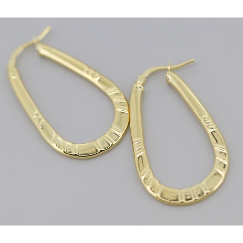 277 - Pair of Modern Form Drop Hoop Earrings Mounted in 9 Carat Yellow Gold 4cm