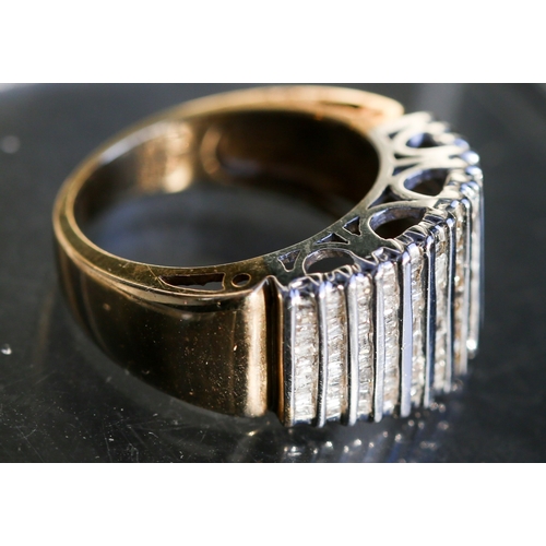 28 - Channel Set Tapered Baguette Cut Diamond Multi Row Cluster Ring Mounted in 10 Carat Yellow Gold Ring... 