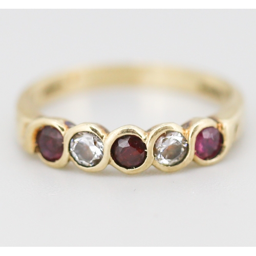 282 - Ruby and Cubic Zirconia Set Five Stone Ring Mounted in 9 Carat Yellow Gold Ring Size N