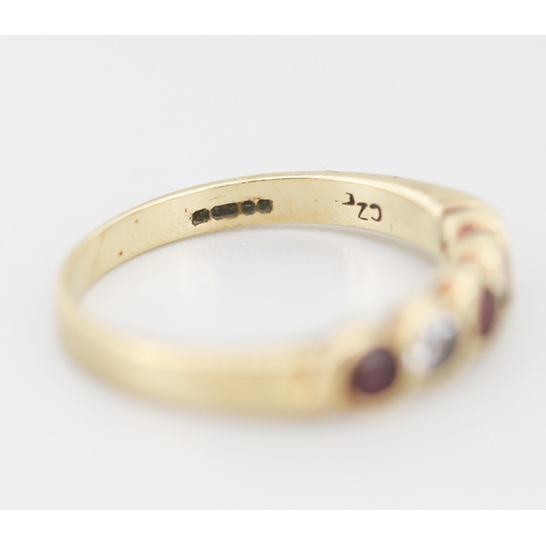 282 - Ruby and Cubic Zirconia Set Five Stone Ring Mounted in 9 Carat Yellow Gold Ring Size N