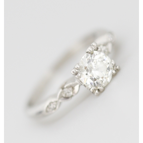 285 - Finely Detailed Diamond Solitaire with Further Diamond Inset to Shoulders Mounted in 18 Carat White ... 