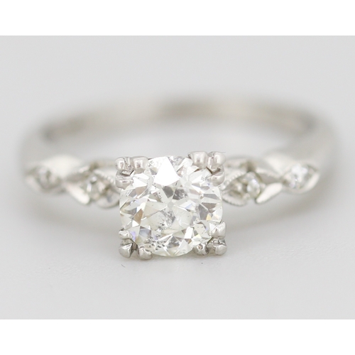 285 - Finely Detailed Diamond Solitaire with Further Diamond Inset to Shoulders Mounted in 18 Carat White ... 