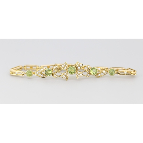 290 - Peridot Five Stone and Seed Pearl Cluster Set Floral Motif Bracelet Mounted in 15 Carat Yellow Gold ... 
