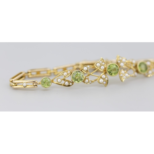 290 - Peridot Five Stone and Seed Pearl Cluster Set Floral Motif Bracelet Mounted in 15 Carat Yellow Gold ... 