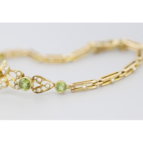 290 - Peridot Five Stone and Seed Pearl Cluster Set Floral Motif Bracelet Mounted in 15 Carat Yellow Gold ... 