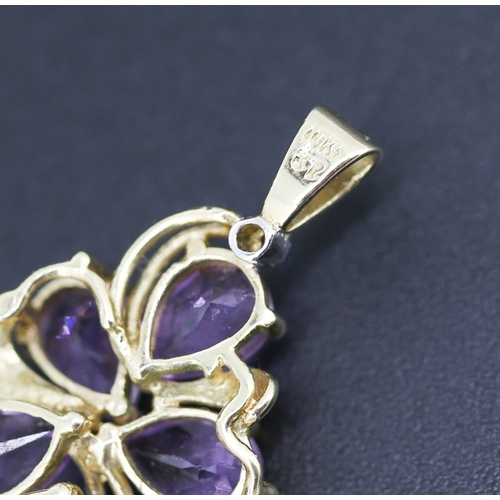 295 - Pear Cut Amethyst Five Stone Set Floral Motif Pendant with Further Diamond Inset Mounted in 14 Carat... 