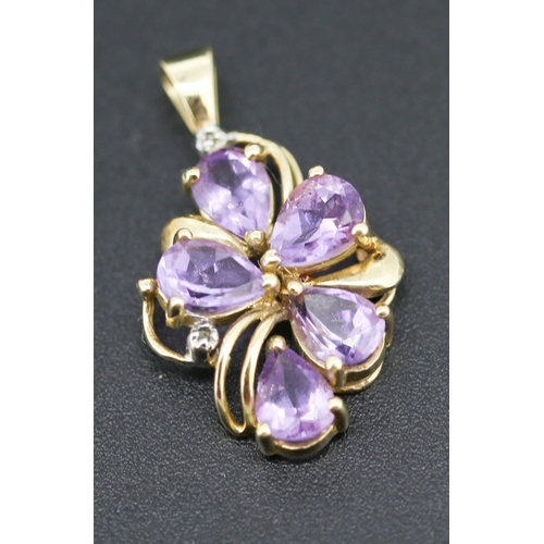 295 - Pear Cut Amethyst Five Stone Set Floral Motif Pendant with Further Diamond Inset Mounted in 14 Carat... 