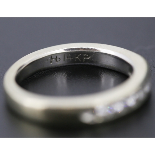 296 - Diamond Seven Stone Channel Set Ring Mounted in 14 Carat White Gold Ring Size J