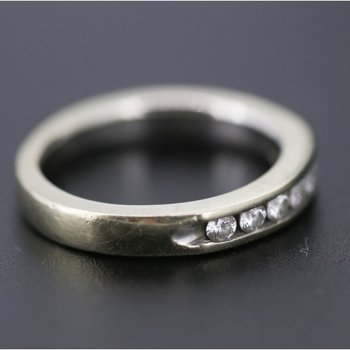 296 - Diamond Seven Stone Channel Set Ring Mounted in 14 Carat White Gold Ring Size J