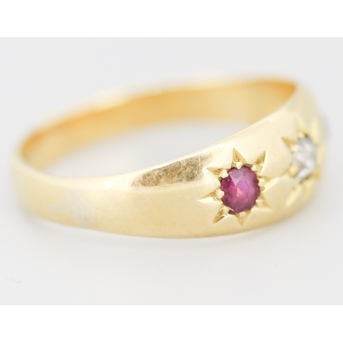 297 - Attractively Detailed Ruby and Diamond Set Three Stone Ring Mounted in 18 Carat Yellow Gold Ring Siz... 