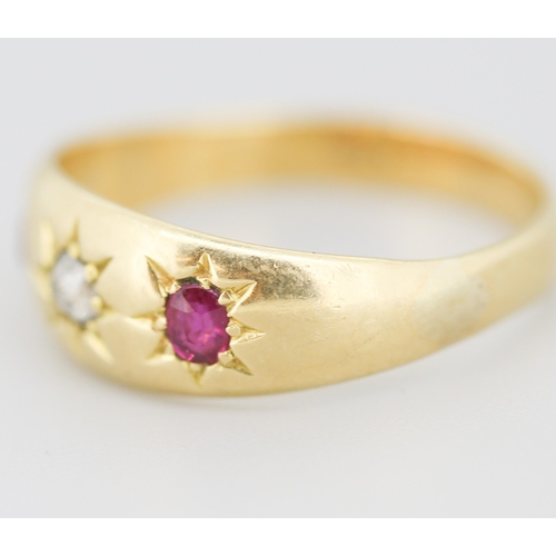 297 - Attractively Detailed Ruby and Diamond Set Three Stone Ring Mounted in 18 Carat Yellow Gold Ring Siz... 