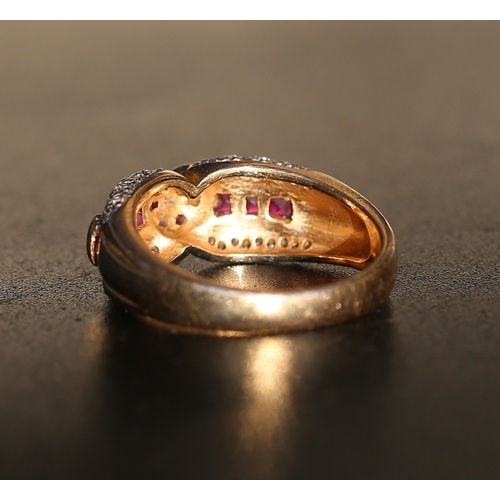 30 - Attractively Detailed Ruby and Diamond Set Heart Motif Ring Mounted in 14 Carat Yellow Gold Ring Siz... 
