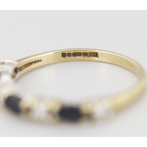 301 - Sapphire and Gemset Seven Stone Set Ring Mounted in 9 Carat Yellow Gold Ring Size M and a Half