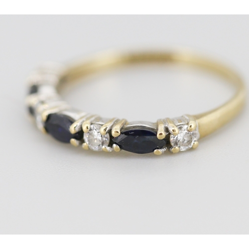 301 - Sapphire and Gemset Seven Stone Set Ring Mounted in 9 Carat Yellow Gold Ring Size M and a Half