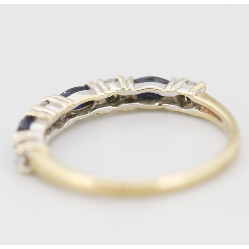 301 - Sapphire and Gemset Seven Stone Set Ring Mounted in 9 Carat Yellow Gold Ring Size M and a Half