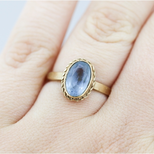 302 - Aquamarine Bezel Set Single Stone Ring Mounted in 9 Carat Yellow Gold Ring Size O and a Half