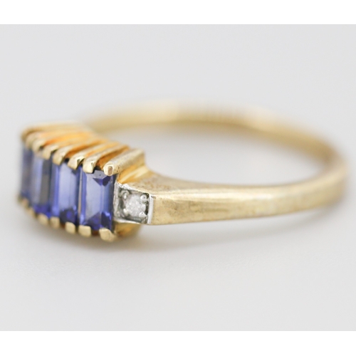 312 - Sapphire Baguette Cut Four Stone Set Ring with Diamond Inset to Shoulders Mounted in 9 Carat Yellow ... 