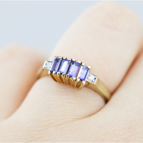 312 - Sapphire Baguette Cut Four Stone Set Ring with Diamond Inset to Shoulders Mounted in 9 Carat Yellow ... 
