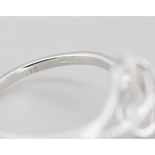 314 - Unusual Form Diamond Set Swirl Motif Ring Mounted in 9 Carat White Gold Ring Size O