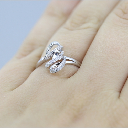 314 - Unusual Form Diamond Set Swirl Motif Ring Mounted in 9 Carat White Gold Ring Size O