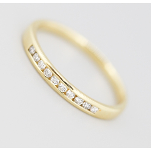 315 - Diamond Ten Stone Channel Set Band Ring Mounted in 18 Carat Yellow Gold Ring Size R