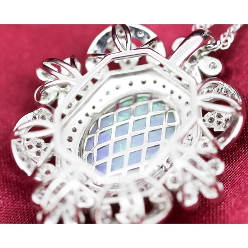 32 - Finely Detailed Opal Centre Stone Pendant with Diamond Floral Motif Cluster Set Surround Mounted in ... 