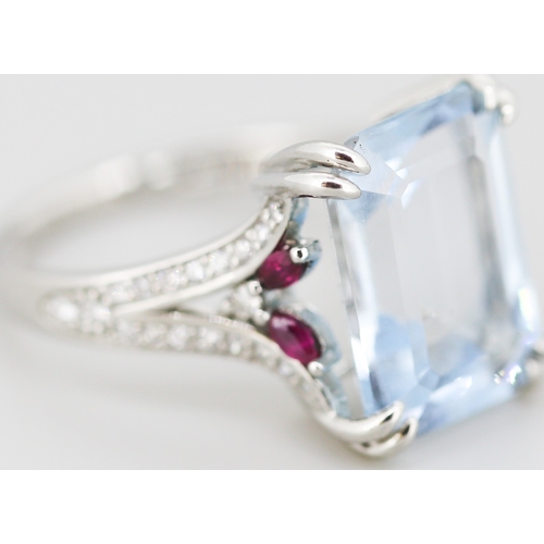 336 - Finely Detailed Emerald Cut Aquamarine Set Ring with Diamond Inset to Shoulders and Further Ruby Ins... 
