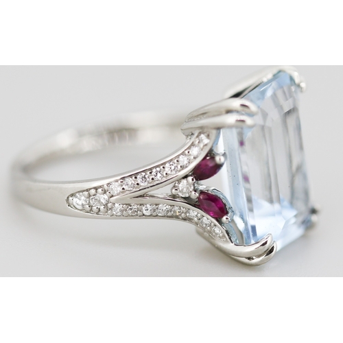 336 - Finely Detailed Emerald Cut Aquamarine Set Ring with Diamond Inset to Shoulders and Further Ruby Ins... 